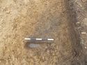 Thumbnail of Evaluation Area 2, Trench 9, probable natural feature in NW end of trench, 0.5M scale, view from SE