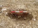 Thumbnail of Area B, NNW facig section of burnt posthole [1019], 0.4M scale, view from NNW