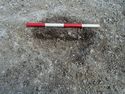 Thumbnail of Area A, S facing section of posthole [3025], 0/.4M scale, view from S