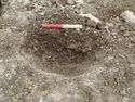 Thumbnail of Area A, S facing section of posthole [3049], 0.2M scale, view from S