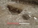 Thumbnail of Area A, oblique view of pit [3043] & posthole [3049], 1M scale, view from SE
