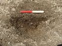 Thumbnail of Area A, S facing section of posthole [3071], 0.2M scale, view from S