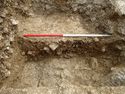 Thumbnail of Area A, sondage through base of water hole & pit [3099], 1M scale, view from WSW