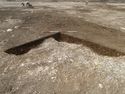 Thumbnail of Area A, general view slot through Romano British pits, 2M scale, view from N