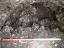 Thumbnail of Area A, E facing section of well 3254, 1M scale, view from W