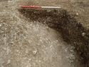 Thumbnail of Area A, W facing section of pit [3296], 1M scale, view from W