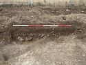 Thumbnail of Area A, S facing section of trench edge through pit [3376],2M scale, view from S