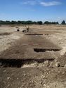 Thumbnail of Area A, working view of re-cut ditch [3086], 2M scale, view from NE