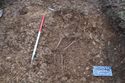 Thumbnail of North-east facing post-excavation shot of burial 2, SK033 (1m scale)