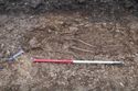 Thumbnail of South-east facing post-excavation shot of burial 2, SK033 (1m scale)
