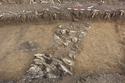 Thumbnail of Construction cut 2421 and posthole 2423 looking SE