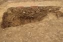Thumbnail of South-east facing section of wedge cut in enclosure ditch [1015]. From Archaeological Recording at West of Culworth, Northamptonshire, England.