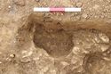 Thumbnail of Working shot of pit [1032] and post-hole [1054], facing north-west. From Archaeological Recording at West of Culworth, Northamptonshire, England.