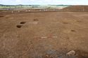 Thumbnail of Overview of pits [1003], [1005] and post-hole [1041], looking north-east. From Archaeological Recording at West of Culworth, Northamptonshire, England.