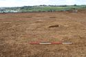 Thumbnail of Overview of pits [1003], [1005] and post-hole [1041], looking south-east. From Archaeological Recording at West of Culworth, Northamptonshire, England.