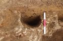 Thumbnail of Geological feature in post-hole [1054], looking west. From Archaeological Recording at West of Culworth, Northamptonshire, England.