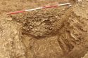 Thumbnail of Oblique shot of south facing section of enclosure ditch [1015]. From Archaeological Recording at West of Culworth, Northamptonshire, England.