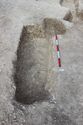 Thumbnail of Photo 3155 W facing overview of post-excavated section of grave [605099] no board.