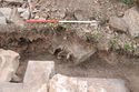 Thumbnail of Trench 5, dislodged masonry block from top of column within SE section, view SE, 1m scale