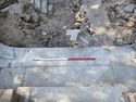 Thumbnail of Trench 1, surface around plunge pool {109}, view ENE, 1m scale