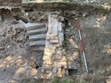 Thumbnail of Trench 1 western exterior wall {108} of Bath House, view SSW, 2m scale