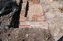 Thumbnail of Trench 7 fireplace {717}, view NNW, 1m scale