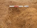 Thumbnail of Ditch [1016], north west facing section of terminus, facing South East. From archaeological recording and construction integrated recording at Thorpe Mandeville, Northamptonshire, England.