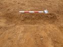 Thumbnail of Ditch [1016], south west facing section of terminus, facing North East. From archaeological recording and construction integrated recording at Thorpe Mandeville, Northamptonshire, England.