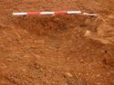 Thumbnail of Ditch [1043], west facing section of terminus, facing East. From archaeological recording and construction integrated recording at Thorpe Mandeville, Northamptonshire, England.