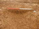 Thumbnail of Ditch [1011]. South East facing section of corner slot-pre, facing North West. From archaeological recording and construction integrated recording at Thorpe Mandeville, Northamptonshire, England.