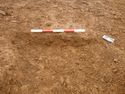 Thumbnail of Ditch [1009]. North East facing section of ditch, facing South West. From archaeological recording and construction integrated recording at Thorpe Mandeville, Northamptonshire, England.