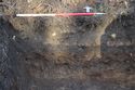 Thumbnail of A photograph of the south facing representative section of trench 1, facing north, scale 1x1m (1 of 2)