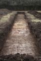 Thumbnail of An overview photograph of trench 2, facing west, scale 2x1m