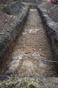 Thumbnail of An overview photograph of trench 4, facing south, scale 2x1m