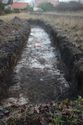 Thumbnail of An overview photograph of trench 5, facing north, scale 2x1m