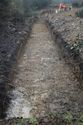 Thumbnail of An overview photograph of trench 11, facing west, scale 2x1m