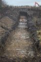 Thumbnail of An overview photograph of trench 7, facing west, scale 2x1m
