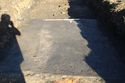 Thumbnail of A focused photograph of [906] concrete surface, facing north, scale 1x1m