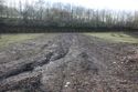 Thumbnail of A photograph of the site post-excavation and backfilling, facing south-west