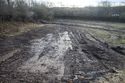 Thumbnail of A photograph of the site post-excavation and backfilling, facing south