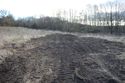 Thumbnail of A photograph of the site post-excavation and backfilling, facing south-east