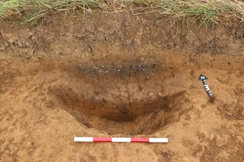 Fully excavated cremation pit 2302 looking North.