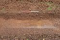 Thumbnail of South facing section ditch 149-04 and pit 149-06