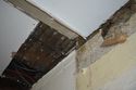 Thumbnail of View to south-east. Wallpaper remants on chimney breast.