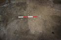 Thumbnail of View to north. Watching brief in Turl Street Gatehouse. Square cut with dark fill, 1x0.40m scale.