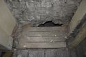 Thumbnail of View to west. Void in floor beneath southern window on west wall. Plate 24.