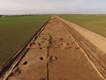 Wessex Archaeology staff pose for drone photography at Brookland