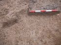 Thumbnail of 110490_to_110498_Mitigation_Image_0381, Set Piece Excavation area 1, north-west facing section of pit 1274 and contexts 1289-1291.