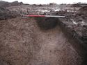 Thumbnail of 110490_to_110498_Mitigation_Image_0543, Set Piece Excavation area 1, north-east facing section of ditch 1711 (part of group 126).