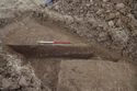 Thumbnail of 110490_Evaluation_Image_09, Report 110490.06 Plate 7, Trench 32, ditch 32011 cutting ditch 32014 and layer 32012, south-east facing.